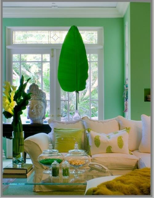 Décoration et accessoires pour le beau canapé vert menthe plante d'intérieur