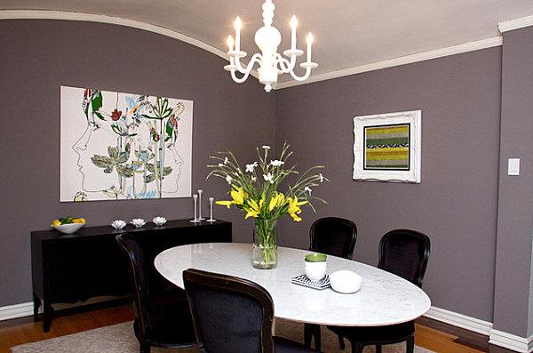 Design d'intérieur éclectique salle à manger table ovale chaises lustre