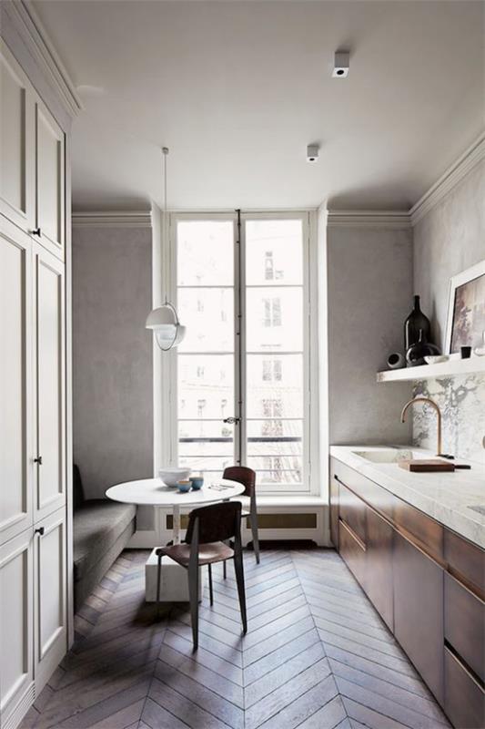Francuski szyk we wnętrzu kuchnia jadalnia zaprojektowana w minimalistycznym stylu