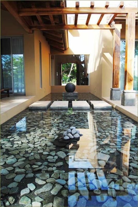 Photos d'étang de jardin Conception de jardin japonais avec des pierres et de l'eau