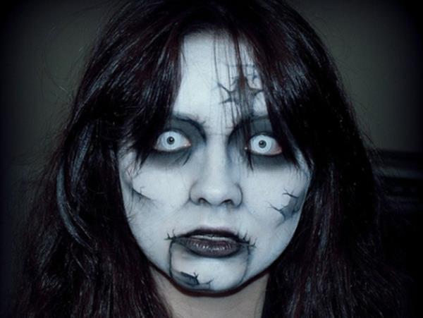 Malowanie twarzy horroru dla bohaterów Halloween