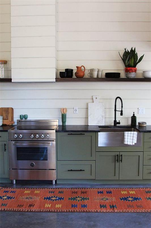 Aneks kuchenny w stylu retro zielone szafki kuchenne nowoczesny piec w stylu rustykalnym wzorzysty bieżnik