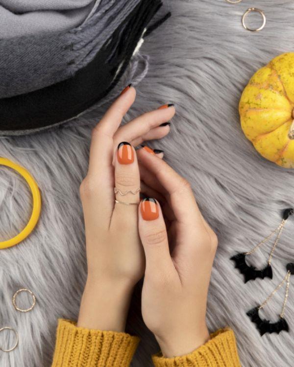Pomarańczowe cieniowanie paznokci trendy