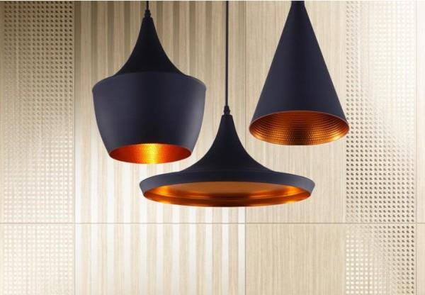 Oryginalne wzory lamp wiszących w tradycyjnej jadalni