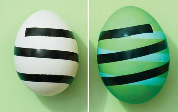 Les oeufs de Pâques peignent des fleurs colorées noires minces