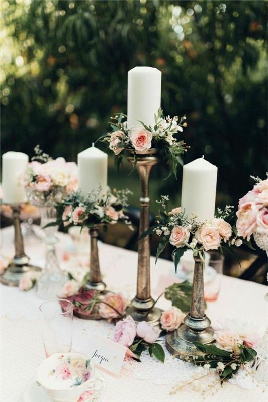 Letnie świece i róże do dekoracji ślubnych