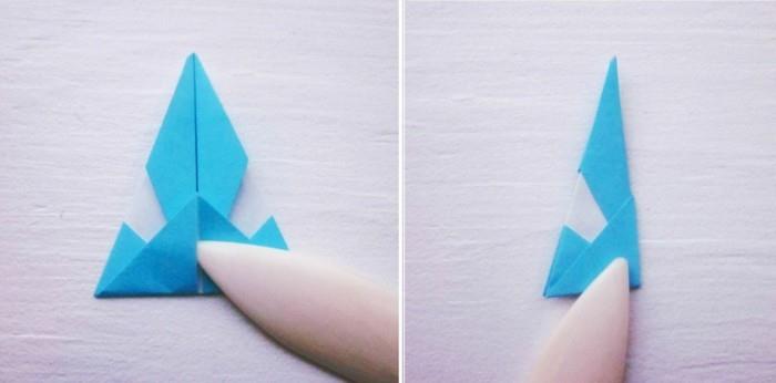 Faire des étoiles pour Noël avec les instructions de l'origami Décoration de Noël étape 4