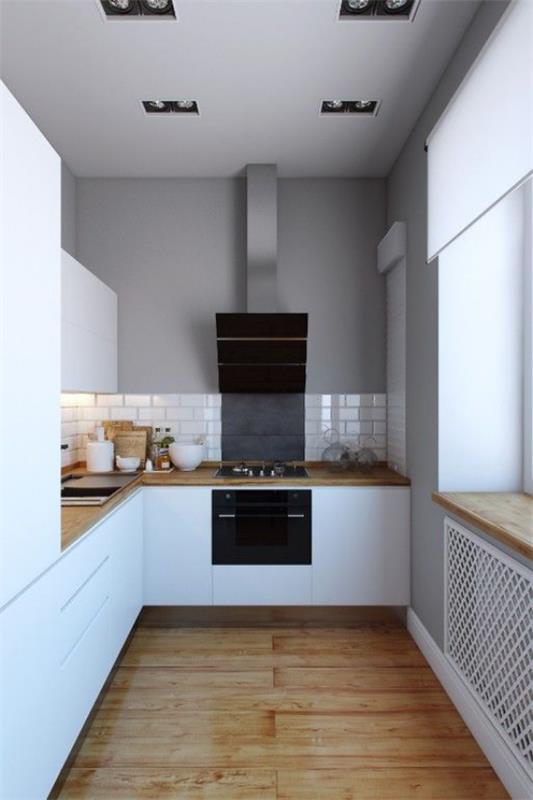 Podziemna kuchnia czysty projekt kuchni białe szafki białe płytki metra drewniane blaty