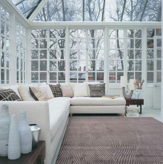 Jardin d'hiver pour se blottir grand espace mobilier élégant couleurs claires