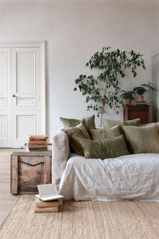 Design d'intérieur contemporain, couleurs vives, canapé, tapis, coussins décoratifs vert olive, une plante verte