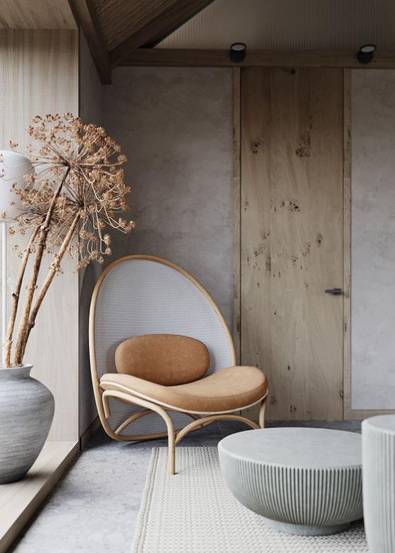 Design d'intérieur contemporain, ambiance lumineuse, design simple, chaise ronde, les formes rondes attirent le regard.