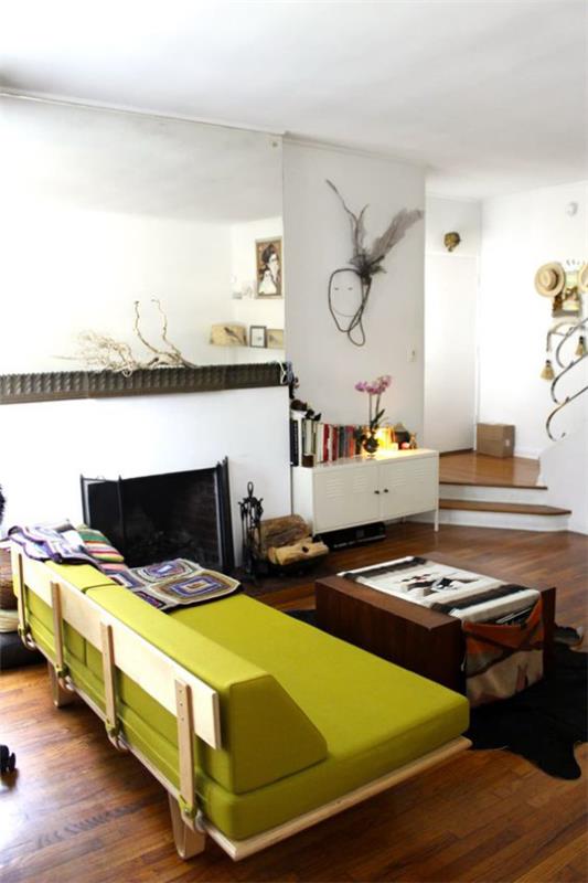 Design d'intérieur contemporain beau salon canapé vert moutarde comme un accroche-regard