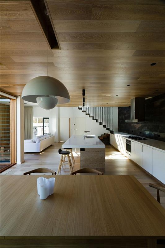 dom architekta nowoczesne wnętrze drewno kuchnia jadalnia drewniany stół