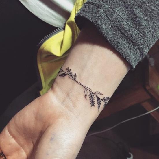 bracelet tatouage dames feuilles vrilles