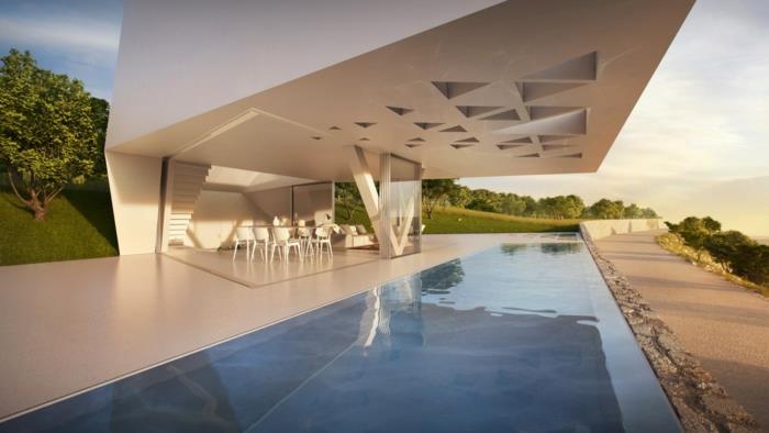 niezwykłe domy wakacyjne nowoczesna architektura futurystyczny betonowy basen zewnętrzny