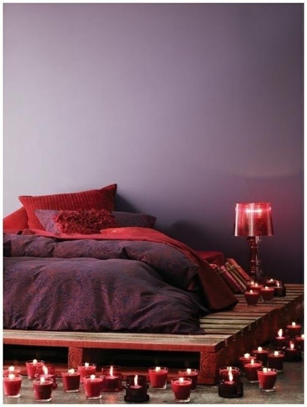 łóżko z palet buduj meble zrób to sam pomysły do ​​sypialni świece
