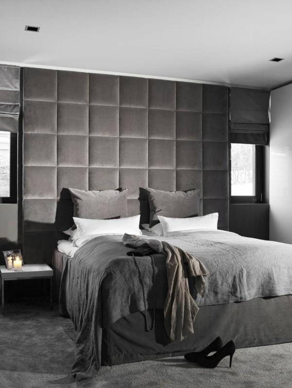 zagłówek łóżka tapicerowany wysoki design szara wykładzina w sypialni