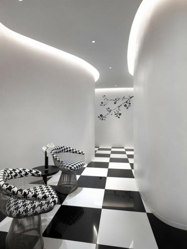 hôtel club à singapour sol en damier design blanc