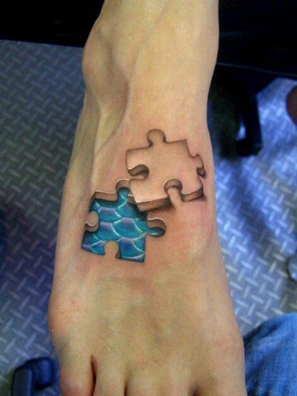 fajne tatuaże puzzle 3d na stopie
