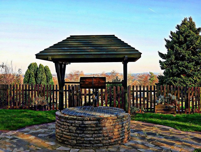 Haus für einen offenen Brunnen