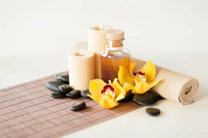 Acheter des huiles parfumées orchidée bougies jaunes pierres rondes