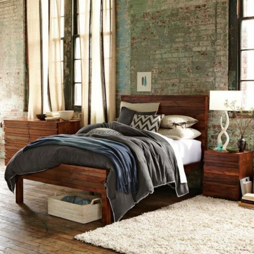 Meubles en bois sombre chambre mur de briques tapis doux lampe de table