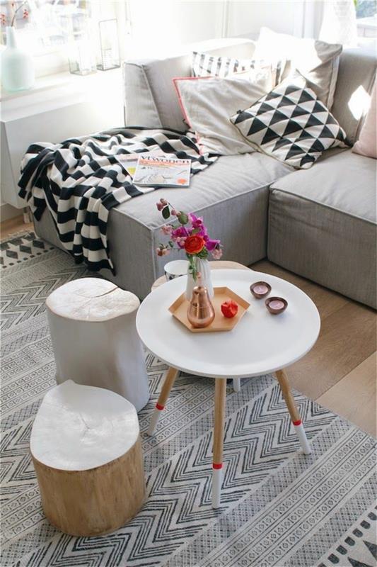 wyposażenie salonu meble skandynawskie stolik kawowy okrągły dywan wzór sofa