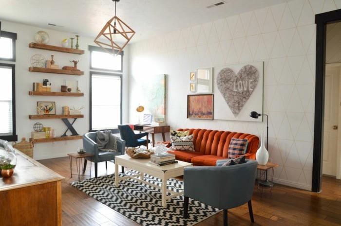 Pomysły na umeblowanie vintage salon półki ścienne pomarańczowa sofa