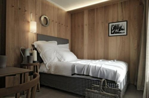 lit simple décoration murale élégante chambre à coucher originale confortable en bois véritable