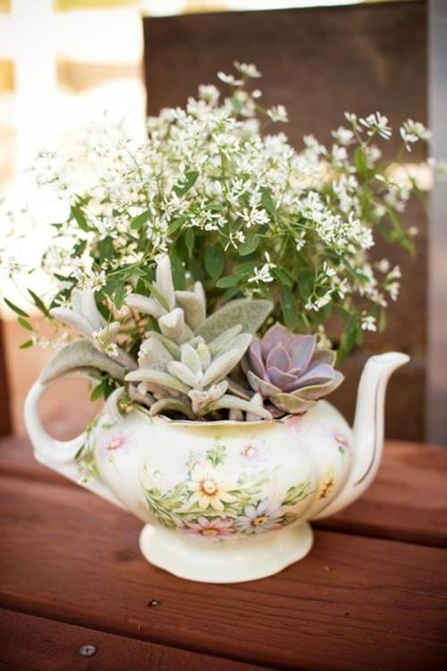udane projektowanie ogrodu rodzaje kwiatów płytki czajniczek wazon na kwiaty