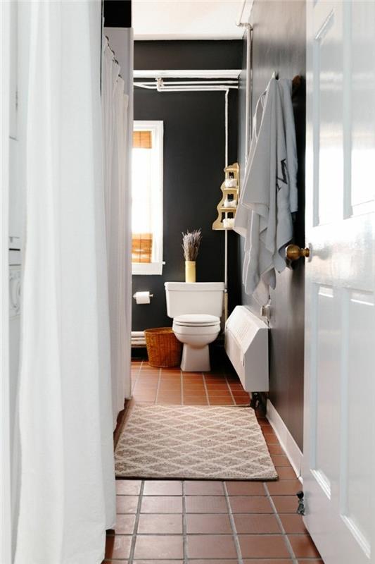 couleurs salle de bain avec mur design en noir tricorne