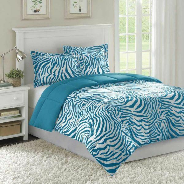 pomysły kolorystyczne meble do sypialni łóżko biała pościel wzór zebry niebieski