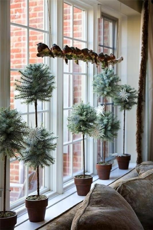 décoration de fenêtre noël plantes en pot décoration de fenêtre noël