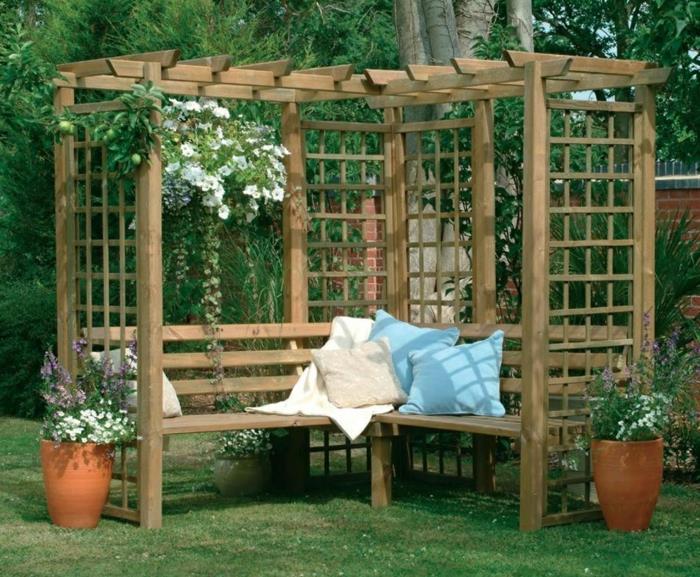 pergola de jardin coin détente coussins pots de fleurs décoration de jardin plantes