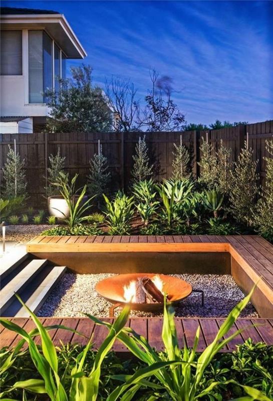 meble ogrodowe nowoczesne oświetlenie kominkowe rośliny