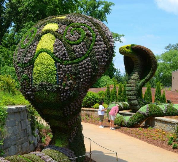 rzeźby ogrodowe węże rośliny sztuka ogrodowa