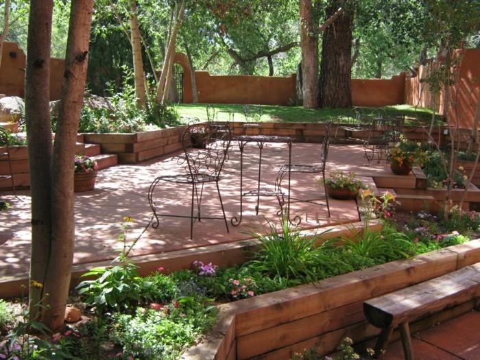 pomysły na aranżację ogrodu stylowe meble ogrodowe i zadbane kwietniki