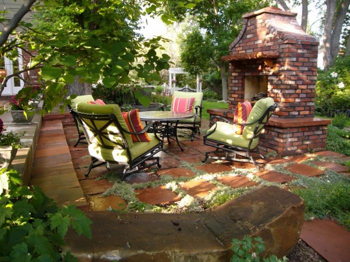 cheminées de jardin meubles de patio en brique design coussins de canapé vert