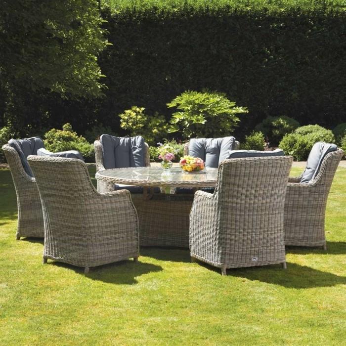 meble ogrodowe fotele rattanowe okrągły stół ogrodowy jadalnia pomysły na projektowanie ogrodu