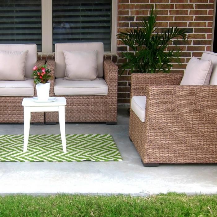 fotel ogrodowy rattanowy elegancki dywan zielony wzór