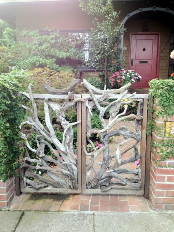 drzwi ogrodowe projektowanie ogrodu gałęzie funkcja dekoracyjna