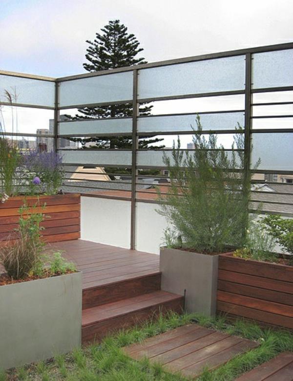 clôture de jardin plantes métalliques modernes plancher en bois jardin