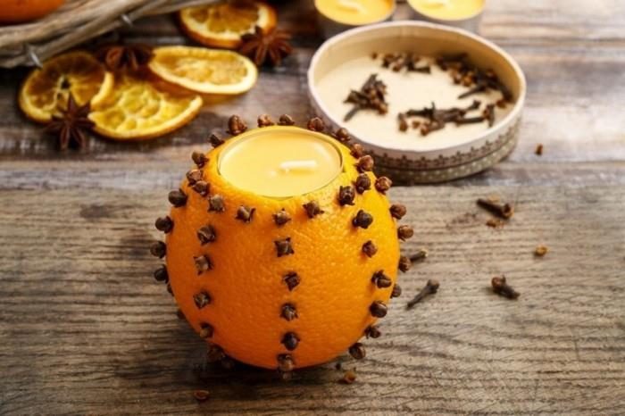 Zrób sam świecę zapachową z goździków i pomarańczy