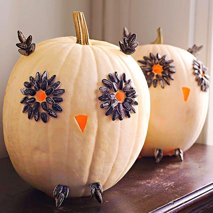 idées d'artisanat d'halloween sculpture de citrouille aux graines de tournesol
