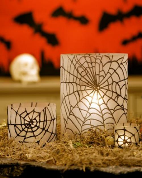 halloweenowe dekoracje stołowe lampiony z wzorami pajęczyny