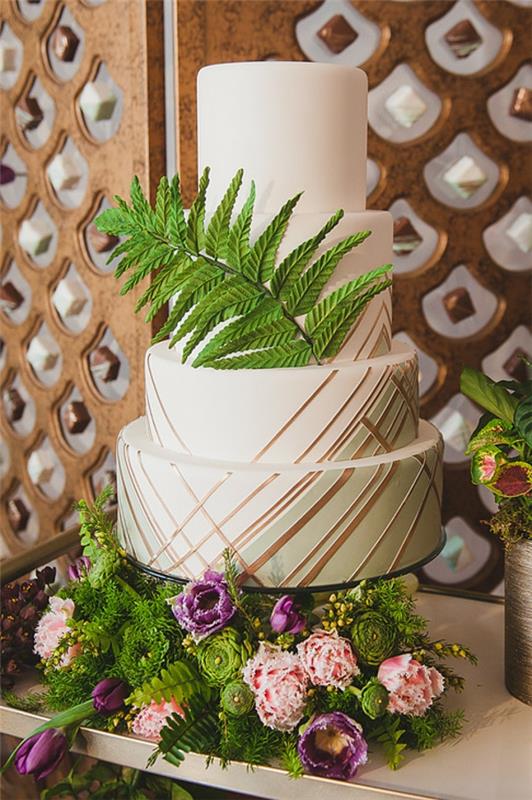 gâteau de mariage rayures design élégant fleurs feuilles de fougère