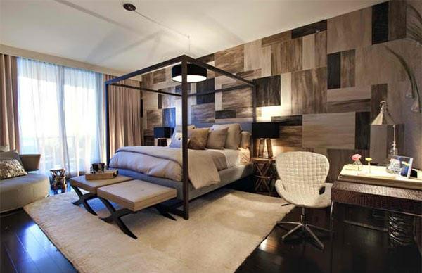 drewniana podłoga w sypialni słupek łóżka dywan kolorystyka brąz beż