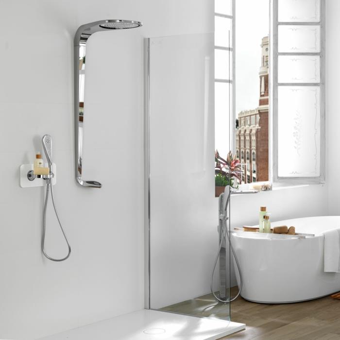 Mała łazienka z wyposażeniem wanna wolnostojąca owalna nowoczesna kabina prysznicowa chrom