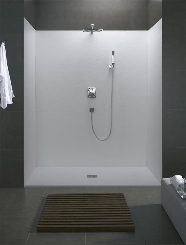 Mała łazienka z prysznicem z otwartą kabiną prysznicową płytki szary prysznic ze strumieniem deszczowym