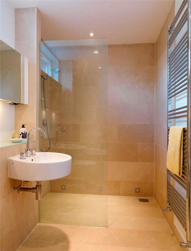 Mała łazienka z kabiną prysznicową otwarta szklana przegroda okrągła umywalka